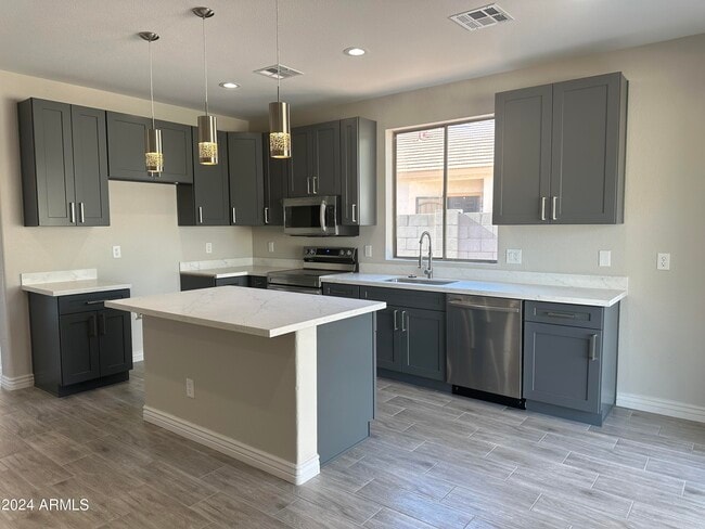Building Photo - 8917 N 65th Dr