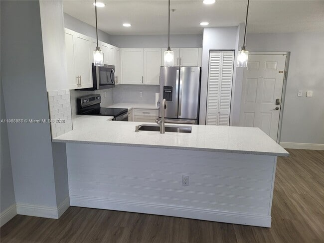 Building Photo - 4440 NW 107th Ave Unit 304-7