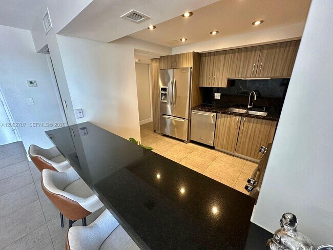 Photo - 801 Three Islands Boulevard Unit 412