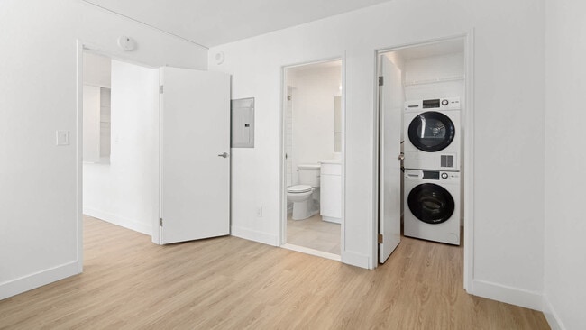 Bedroom with In-home Washer and Dryer