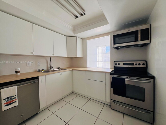 Photo - 501 Three Islands Boulevard Condo Unit 119