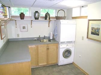 Washer and dryer in basement. There is also bathroom and shower and sauna in the basement. - 2261 Scudder Street