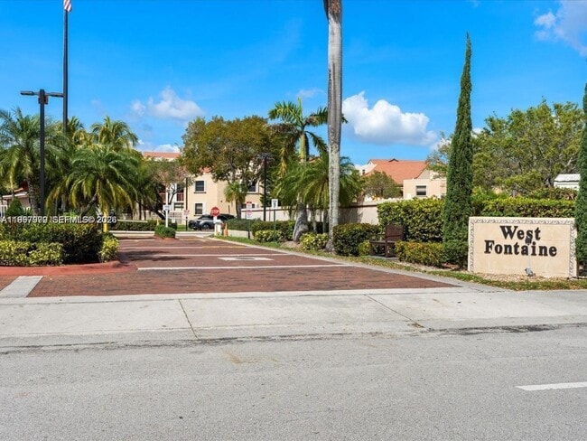 Building Photo - 10241 NW 9th St Cir Unit 213-5