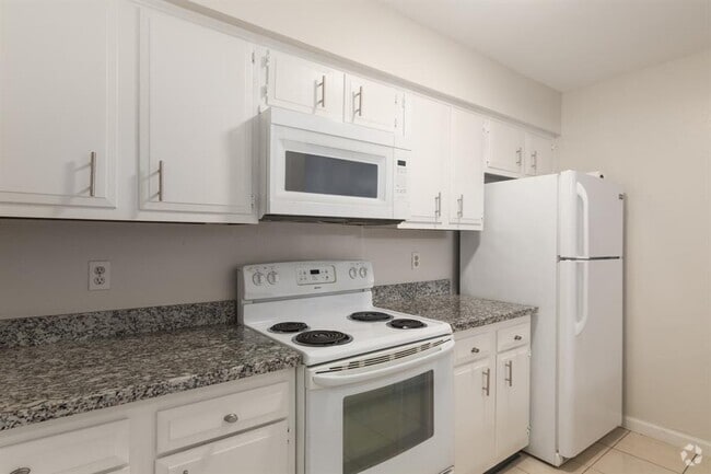 Building Photo - 10555 Turtlewood Ct Unit 605 Rental