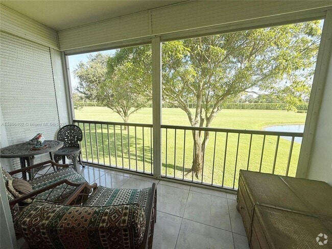 Building Photo - 9820 S Hollybrook Lake Dr Unit 202 Rental