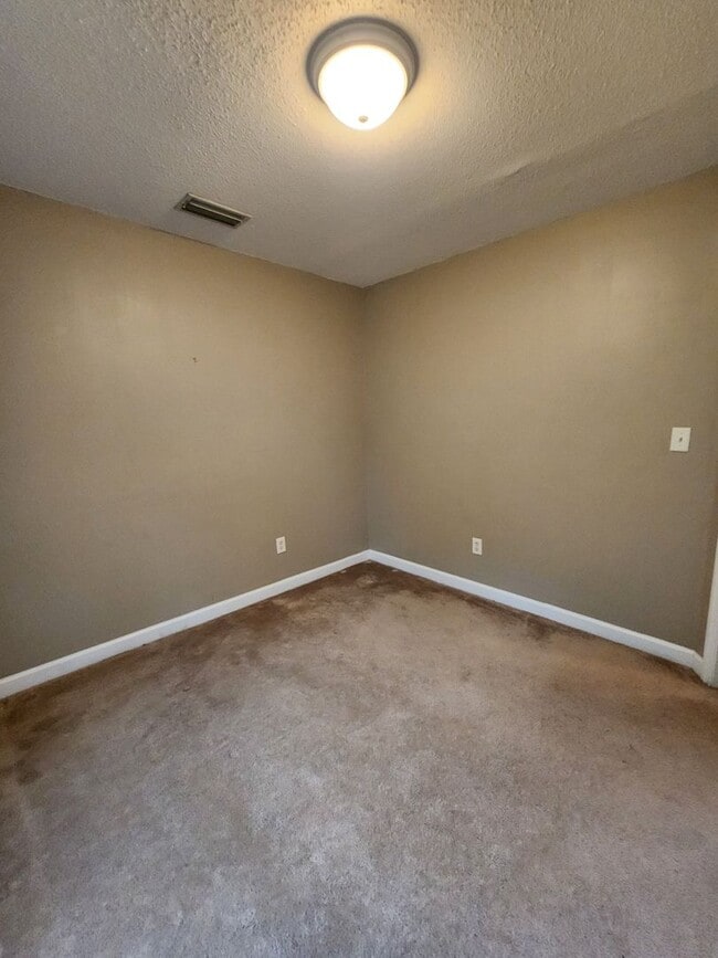 Photo - Charming 3BR/2BA Home with Open Floor Plan, Vaulted Ceilings & 2-Car Garage
