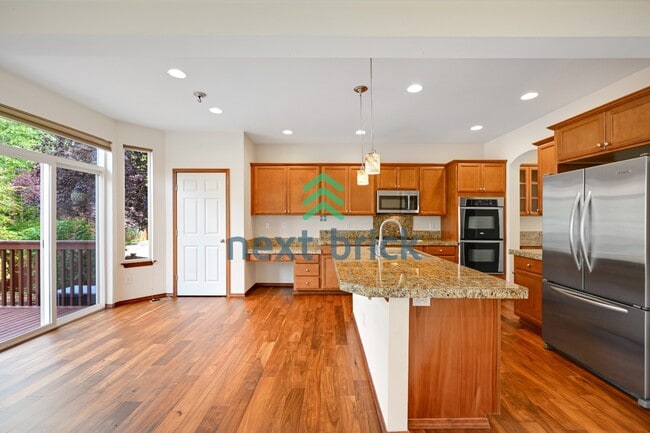 "Charming 4-Bed Kenmore Haven: Spacious 2,440 Sq Ft with 2.5 Baths!"
