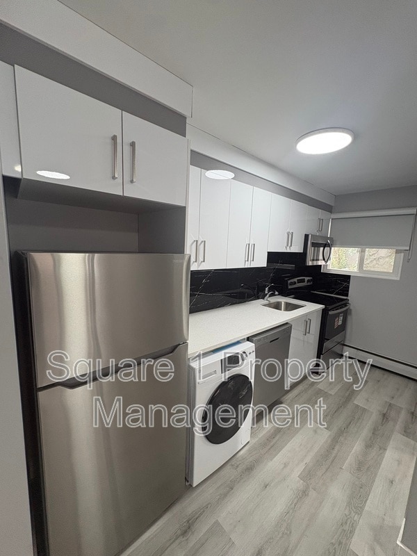 Building Photo - 9813-9104 104 Street NW Unit 7