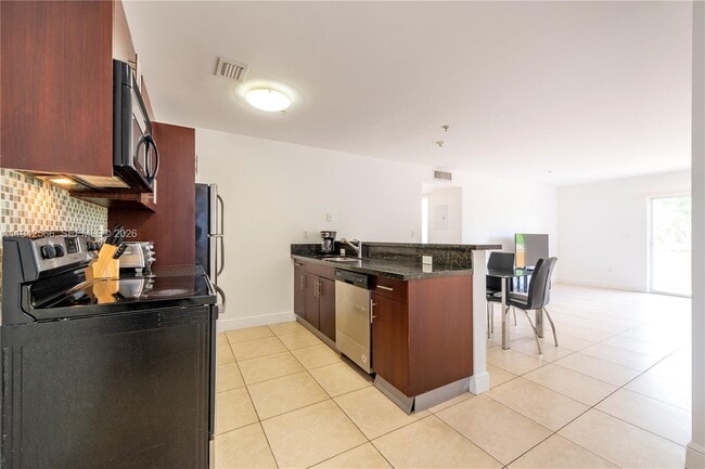 Photo - 4147 Stirling Rd Unit 301