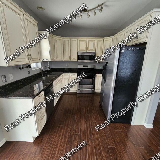 Photo - Well Kept 4 Bedroom Home