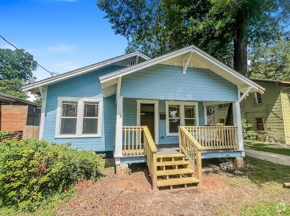 Building Photo - "Charming MIDTOWN 2-Bedroom Home with Glea...