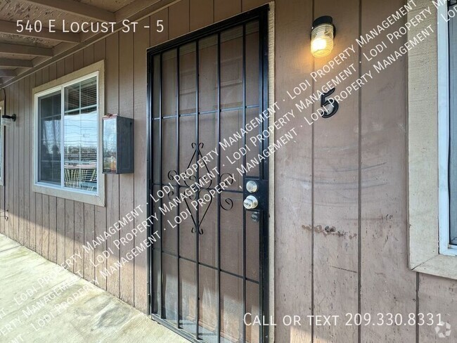 Building Photo - Upstairs 2 Bedroom - Price Reduced! Unit 5 Rental