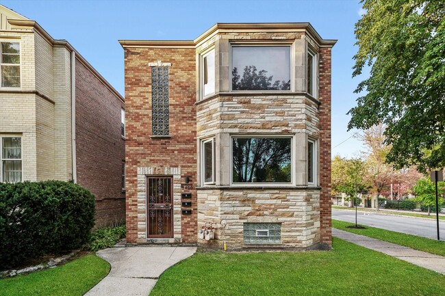 Building Photo - 5400 W Berteau Ave