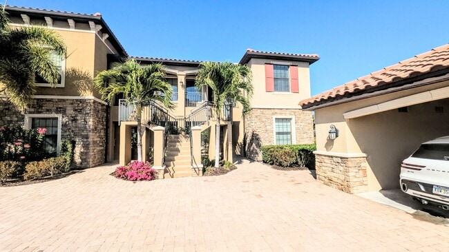 Building Photo - Seasonal/short term turnkey furnished Incredible 2/2 with den ground floor condo in resort Esplan...