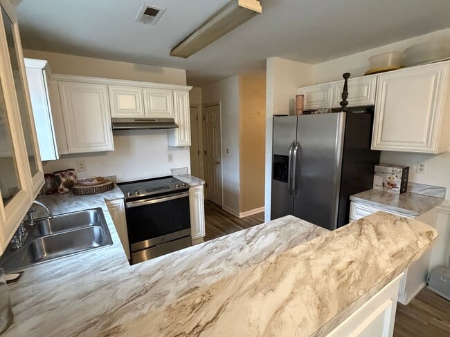 Photo - Spacious 4-Bedroom Rental Home with Garage