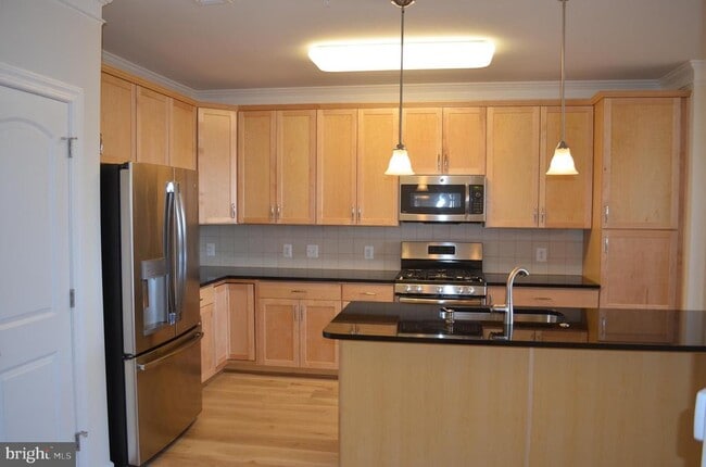 Photo - 13724 Neil Armstrong Ave Unidad 307