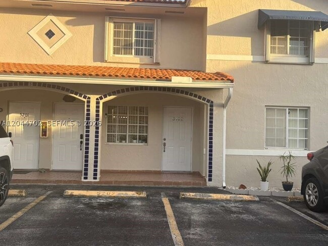 Building Photo - 10101 W Okeechobee Rd Unit 5202