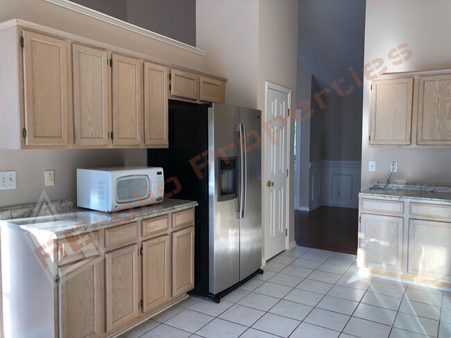 Photo - Elegant 4 Bedroom 2.5 Bath House w/ Primary Suite on 1st Floor + a Fenced-in Backyard @ Park Vill...