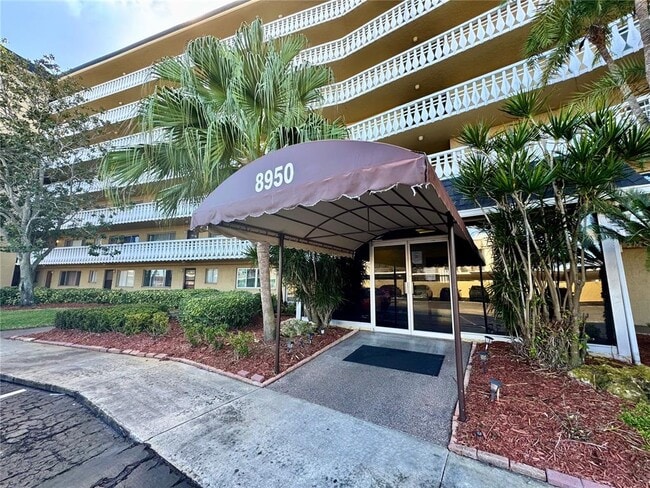 Building Photo - 8950 Park Blvd Unit 707