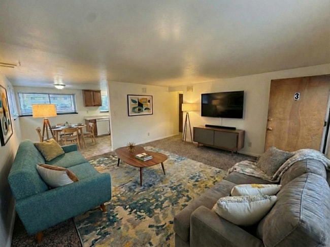 Building Photo - Central Loveland! Spacious 2 Bedroom / 1 Bathroom Garden Level Apartment. WATER/SEWER/TRASH INCLU...