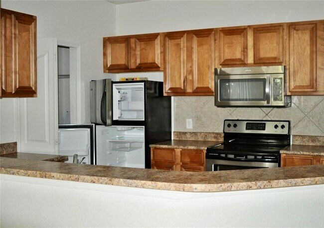 Photo - 6157 Metrowest Blvd Unit 208