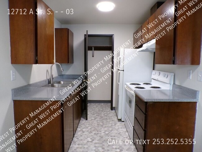 Building Photo - 12712 A St S Unit 03