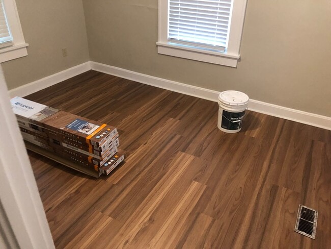 Photo - Freshly Painted 2x1 with Brand-New Plank F...