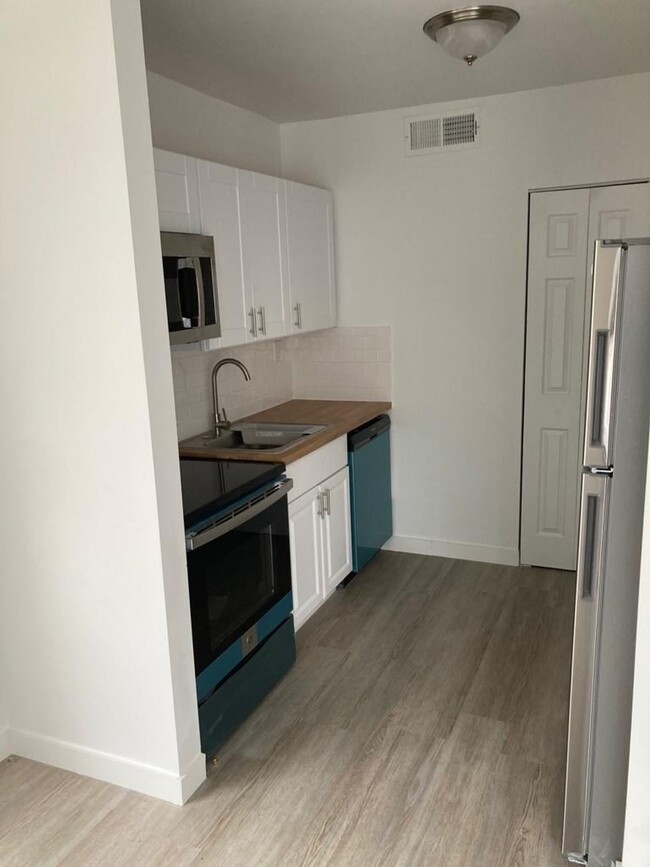 Photo - Cozy 2-Bedroom Apartment with Convenient A... Unit 3751-2F
