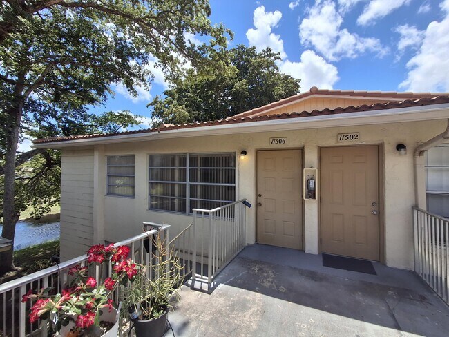 Building Photo - 11506 Royal Palm Blvd Unit 11506