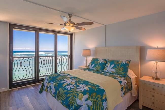 Building Photo - PENTHOUSE - BEACH FRONT End unit furnished 2/2/1PKG CONDO