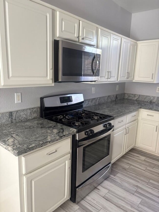 Photo - one story house with 3 bedrooms