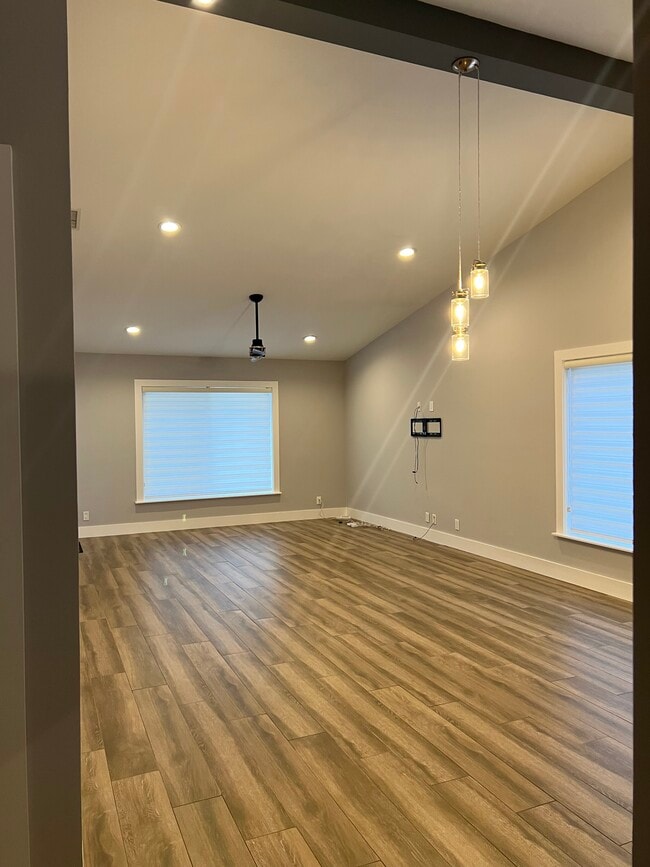 Living Room with Vaulted Ceilings - 10961 SW 11th Pl
