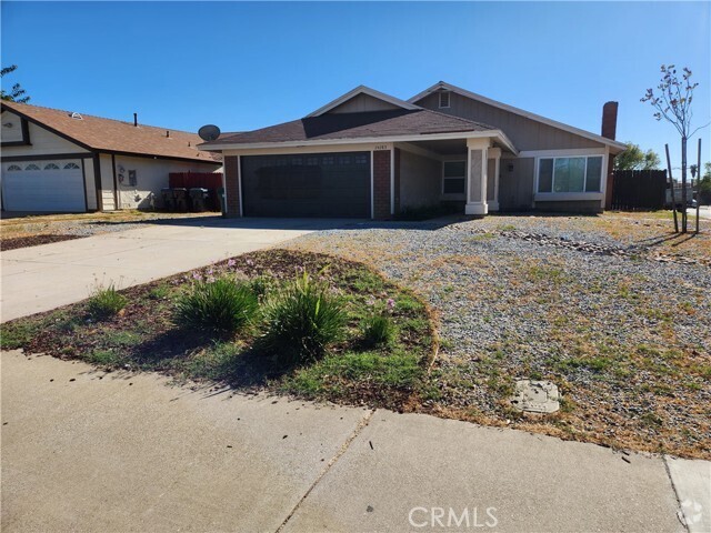 Building Photo - 24283 Delphinium Ave Rental