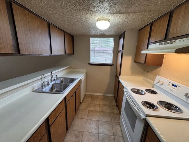 Photo - 2 bed duplex with 1 1/2 baths, bonus room and a 1 car garage for lease in SW OKC! (no fenced yard)