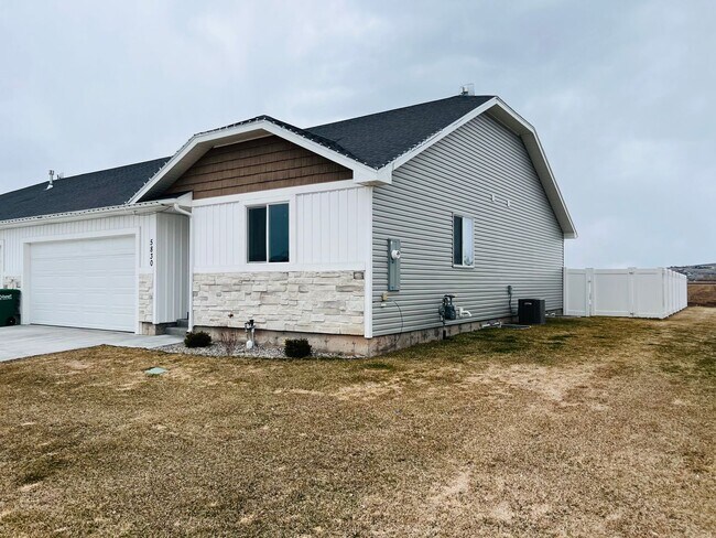 Photo - 5 Bed 3 Bath townhome with a 2 car garage ...