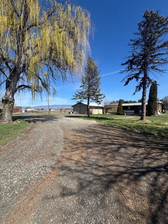 Building Photo - Spacious Pet-Friendly Rental on 3 Acres — Perfect for Horse Owners!