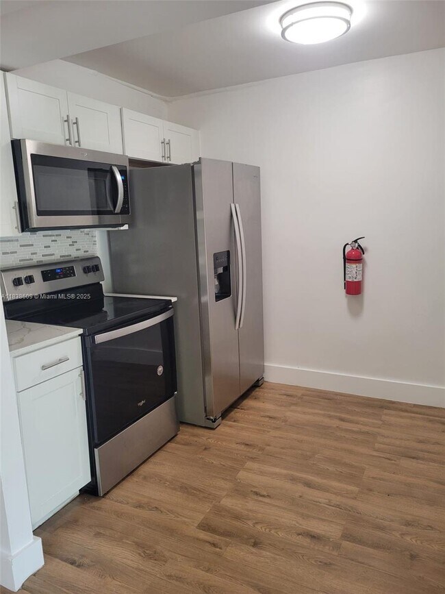 Building Photo - 5967 NW 27th Pl Unit 153 Rental