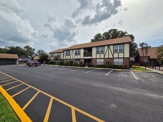 Building Photo - Lakefront First-Floor Condo in Camelot by ... Unit N-13