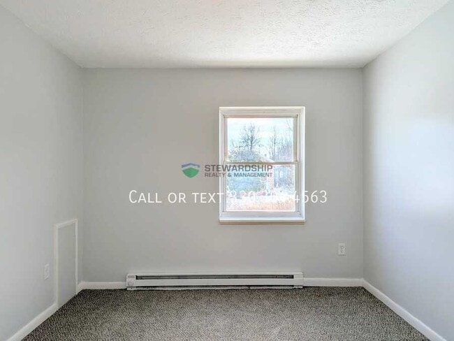 Photo - 1111 N Elm St Unidad E