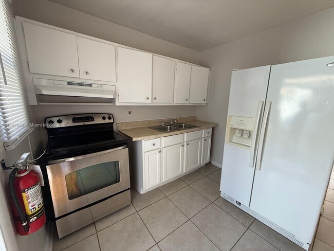 Photo - 520 W Blue Heron Blvd Unit 1