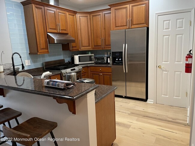 Photo - 11 Cooper Ave Unit 110