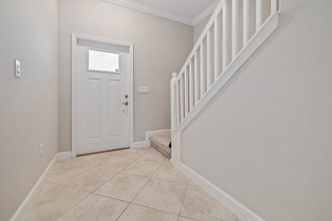 Photo - "Spacious 4-Bed Oasis with Granite Charm in Lutz!"In a gated community with 2 Cars garage