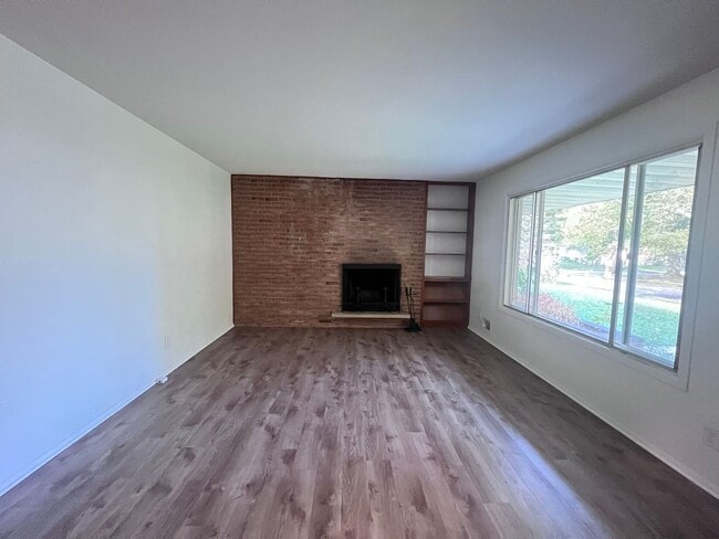 Photo - Two Bedroom Duplex SE Side w/ Decorative Fireplace! One Stall in Garage!