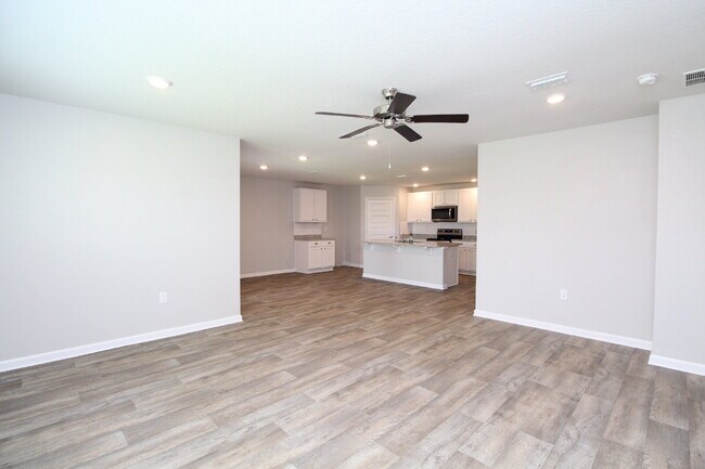 Photo - Coming Available Soon – 4BR/2BA Brick Home with Open Floor Plan, Solar Panels & 2-Car Garage in L...