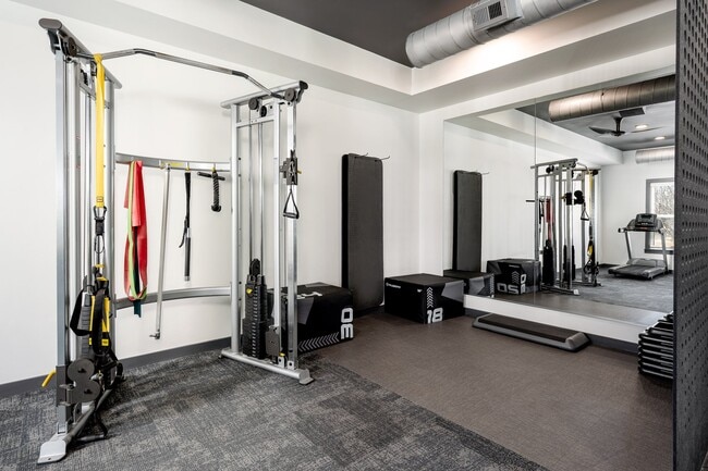24-Hour Cardio and Strength Training Fitness Center featuring Peloton Bike, Hub Training System, Water Rower, Free Weights and More!
