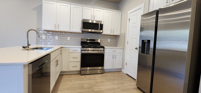 Photo - 1 MONTH FREE(OAC) 4-bed, 3.5-bath Townhome Available early June