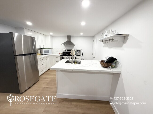 Building Photo - 2-Bedroom Basement Apartment with In-Unit Laundry – Water & Gas Included – Kitchener Unit 2