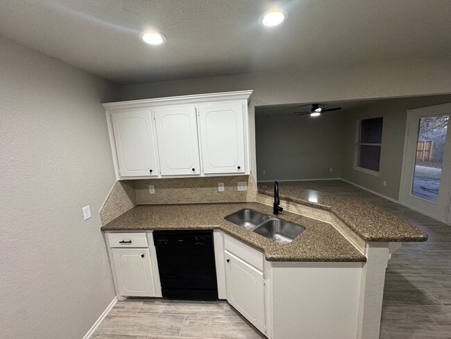 Photo - Storm Shelter!!! This 3 bed, 2 bath, 2 Car Garage home has new paint, kitchen and bathroom granit...