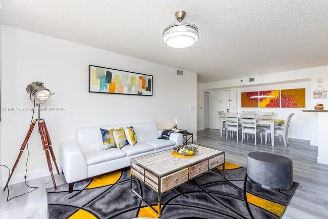 Building Photo - 19999 E Country Club Dr Unit 1403