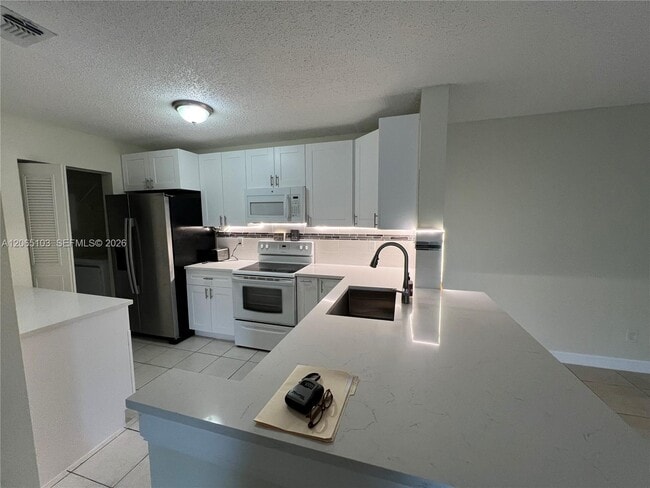 Photo - 11277 W Atlantic Blvd Unit 304